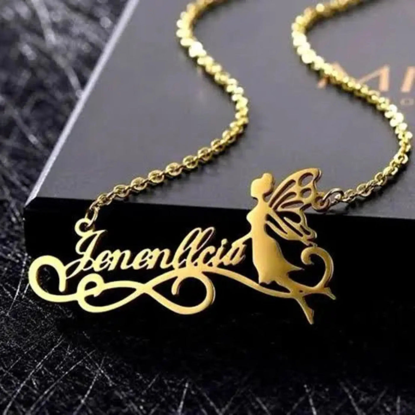  "Unique engraved name locket with a delicate yet modern touch."