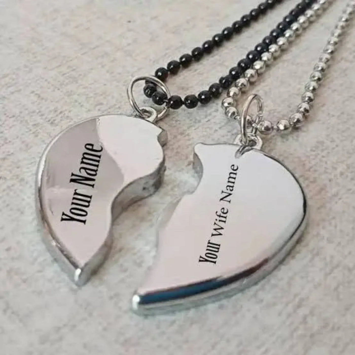  Silver broken heart necklace with custom engraved names, featuring a split heart pendant on a sterling silver chain. Perfect for couples, best friends, or family gifts.