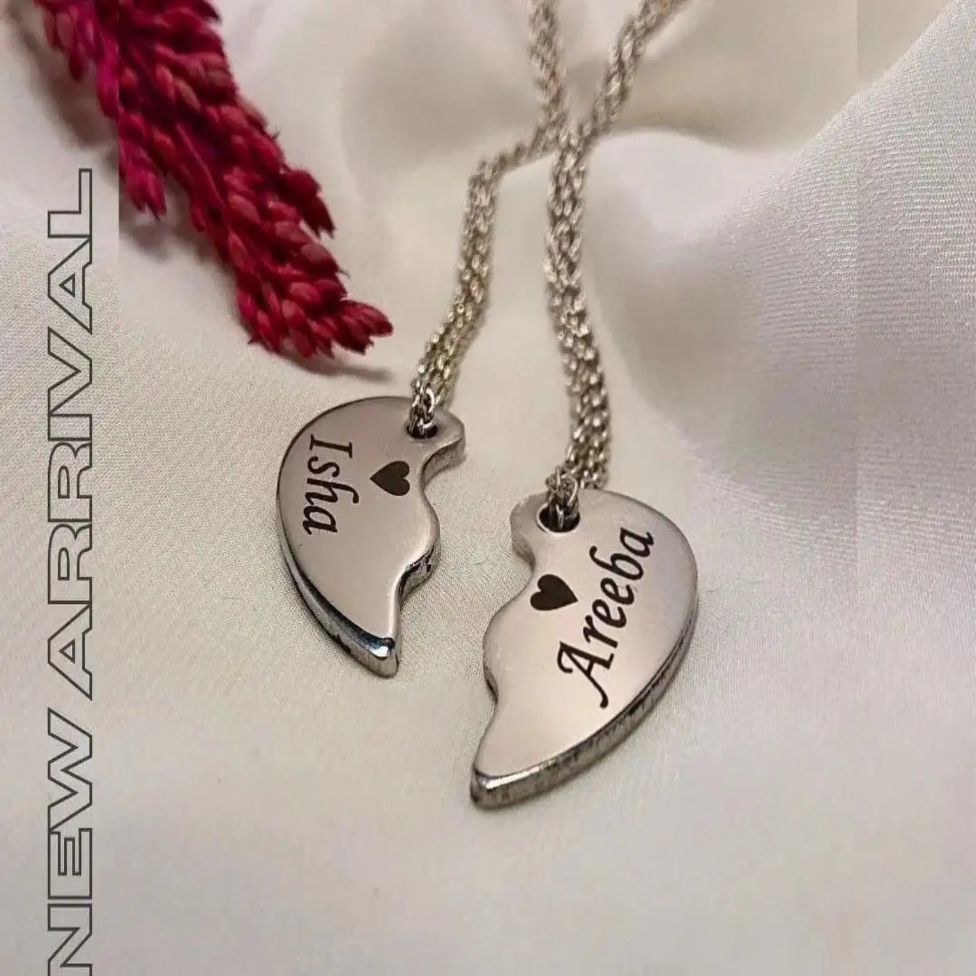 Silver broken heart necklace with custom engraved names, featuring a split heart pendant on a sterling silver chain. Perfect for couples, best friends, or family gifts.