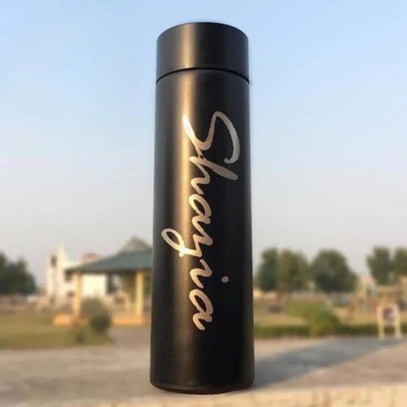 "Smart water bottle with temperature display and custom name"
